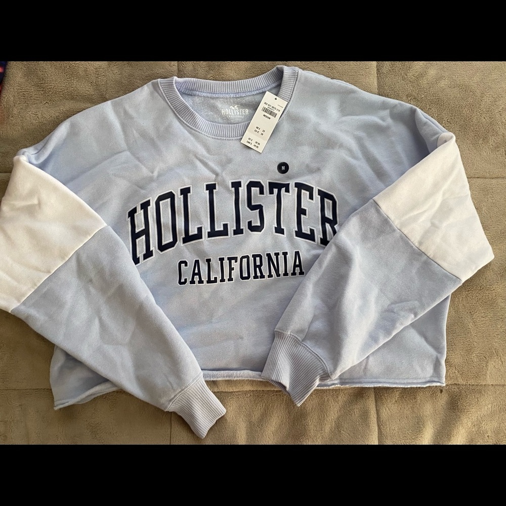 Hollister blue and white oversized crop crewneck with navy blue and white words